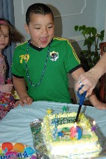 Boy with birthday cake